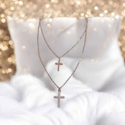 Zwei Kreuze – Eleganz in Roségold.