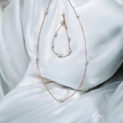 Damen-Set: Halskette & Armband in Goldoptik mit Perlen.
